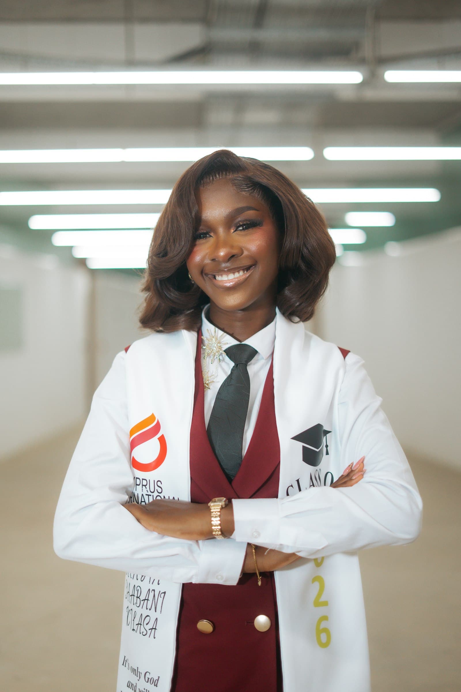 A smiling pharmacy graduate